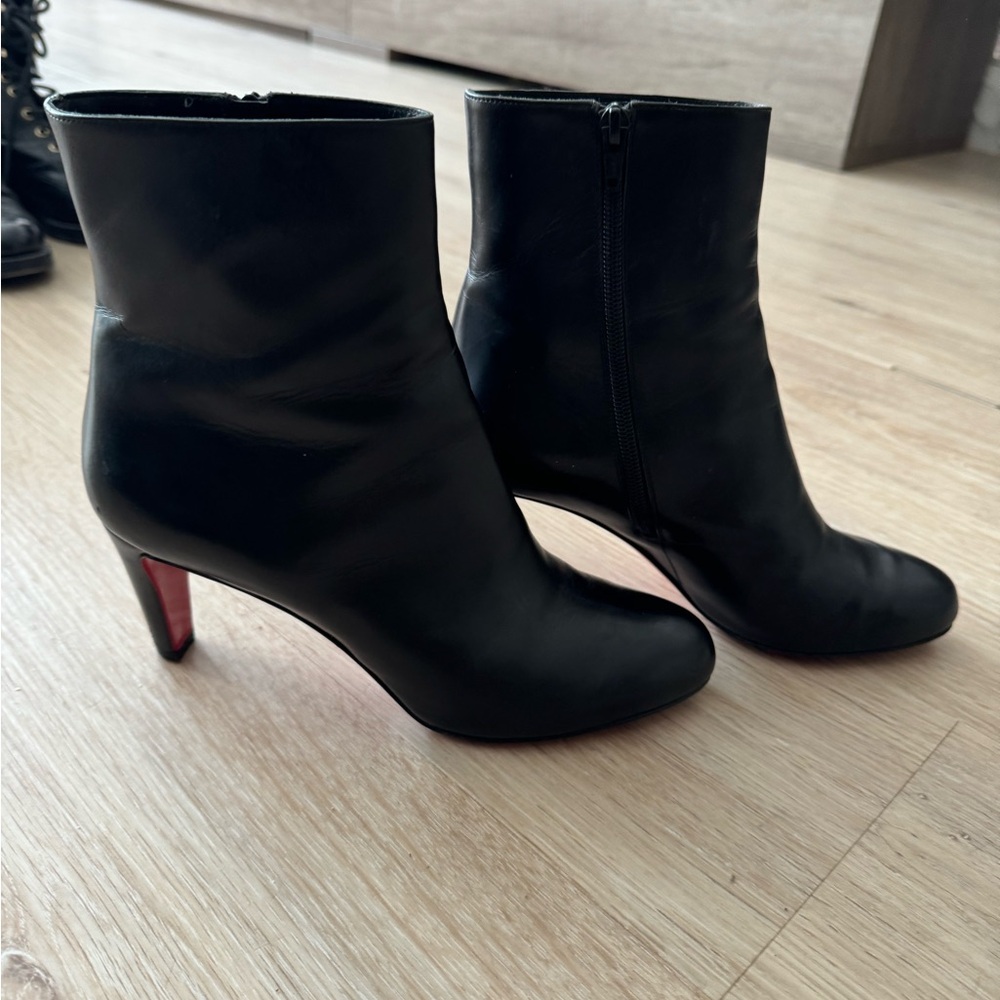 Christian Louboutin Black Heeled Boots with Red Sole